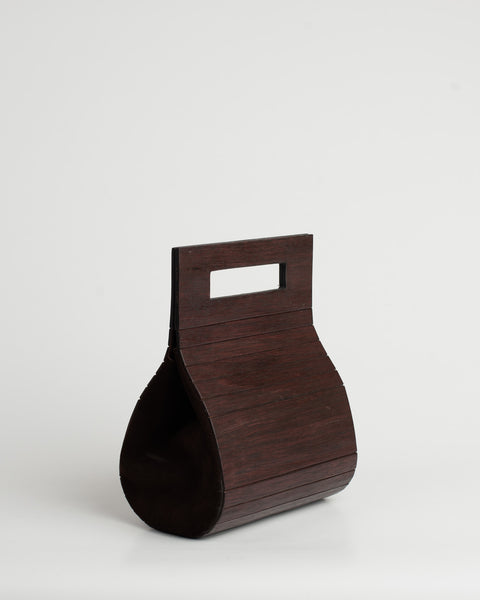 Bolso de Mano Tallado en Madera Oscura
