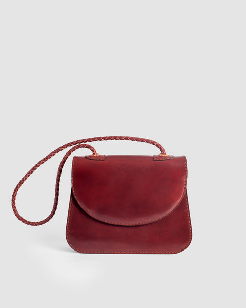 Cognac-colored natural leather bag